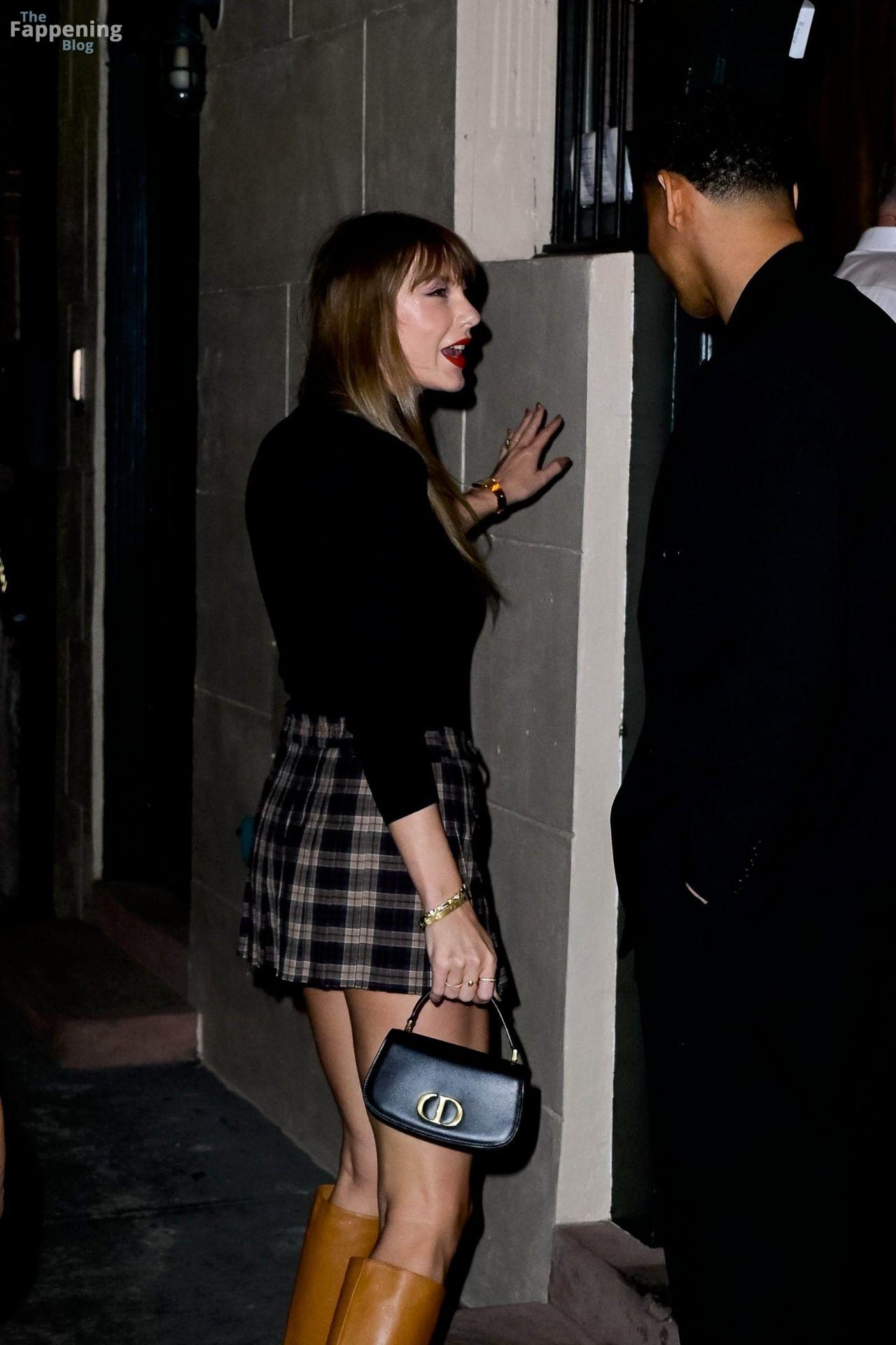 taylor-swift-sexy-legs-mini-skirt-boots-nyc-006-the-fappening-pics_