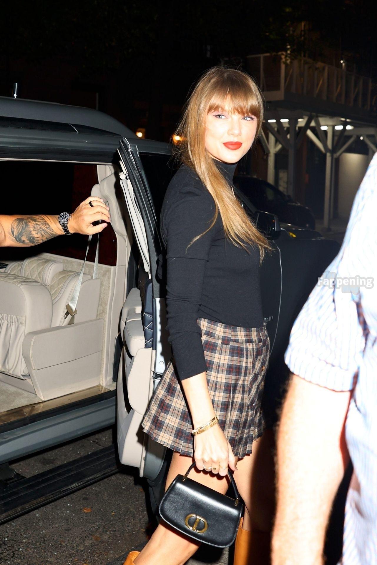 taylor-swift-sexy-legs-mini-skirt-boots-nyc-024-the-fappening-pics_